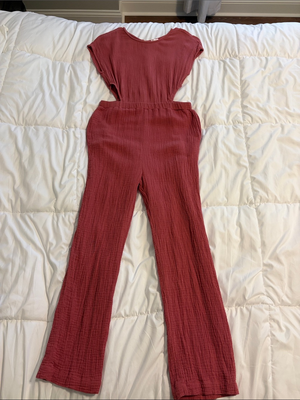 Francesca’s pink romper with side cutouts - Size 14